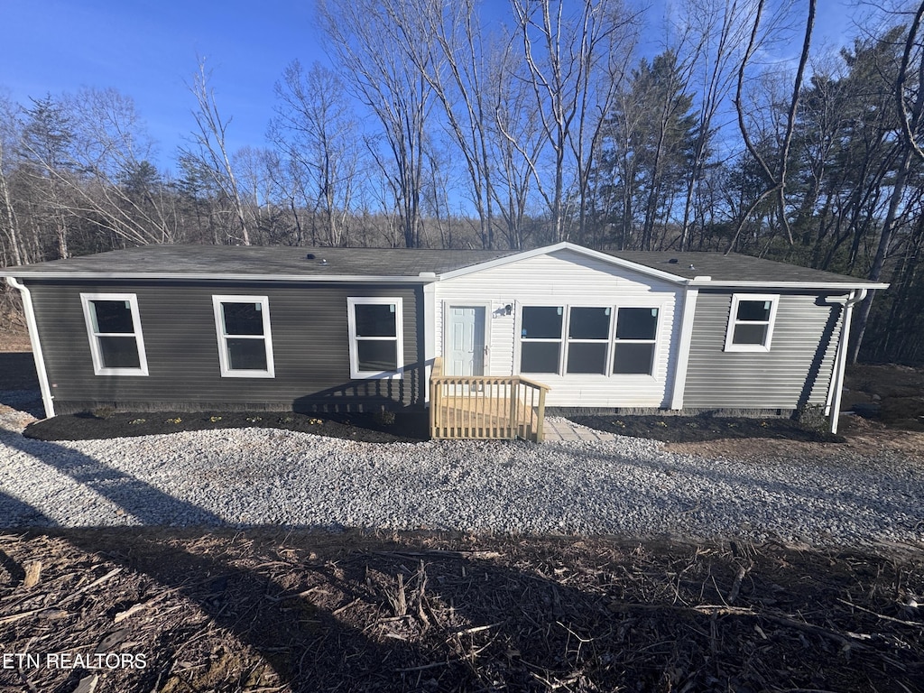 back of house with crawl space