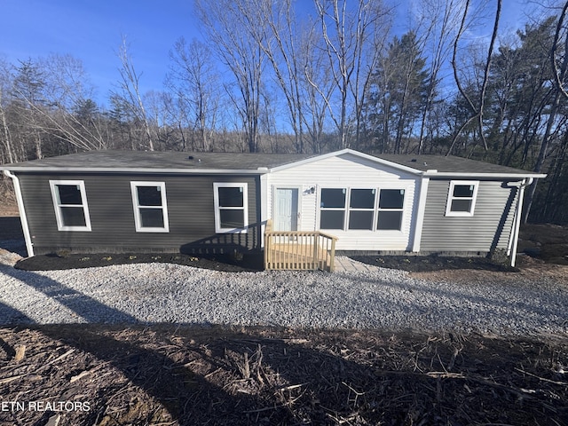 back of house with crawl space