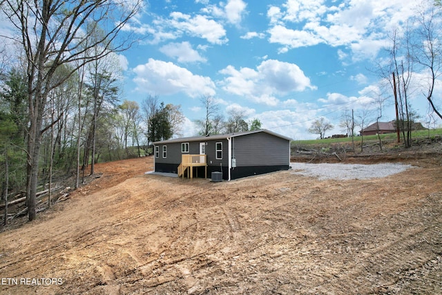 view of front of home featuring central AC unit