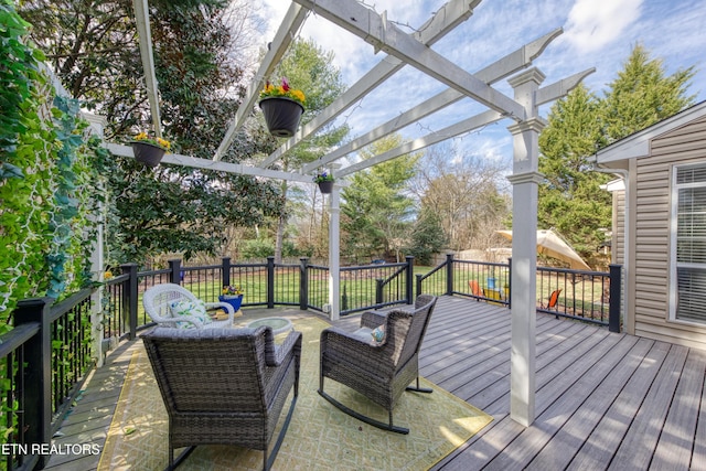 wooden terrace featuring an outdoor hangout area and a pergola