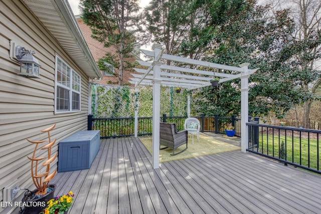 wooden deck featuring a pergola