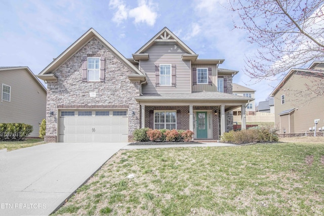 craftsman house with concrete driveway, brick siding, an attached garage, and a front lawn