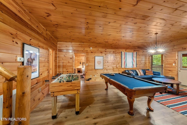 recreation room with wooden ceiling, billiards, wood finished floors, and wood walls