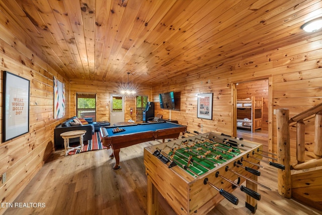 rec room featuring pool table, wood walls, wood finished floors, and wood ceiling