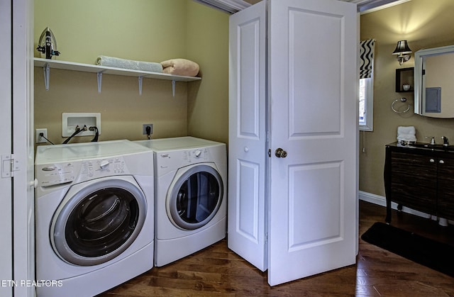 laundry area featuring laundry area, washing machine and dryer, and dark wood-style floors