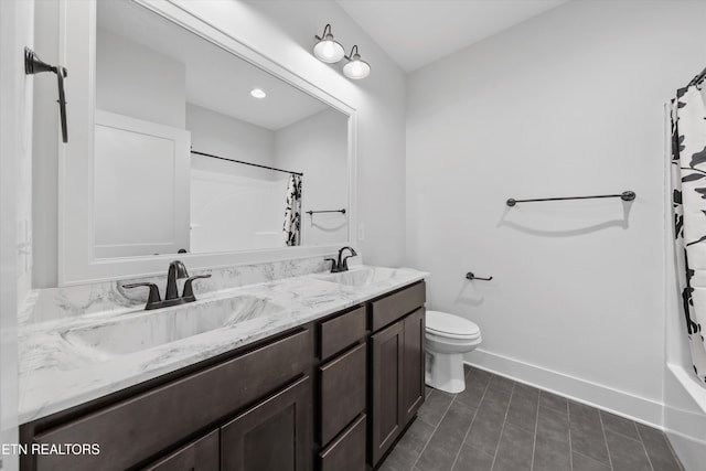 bathroom with a sink, baseboards, a shower with curtain, and double vanity