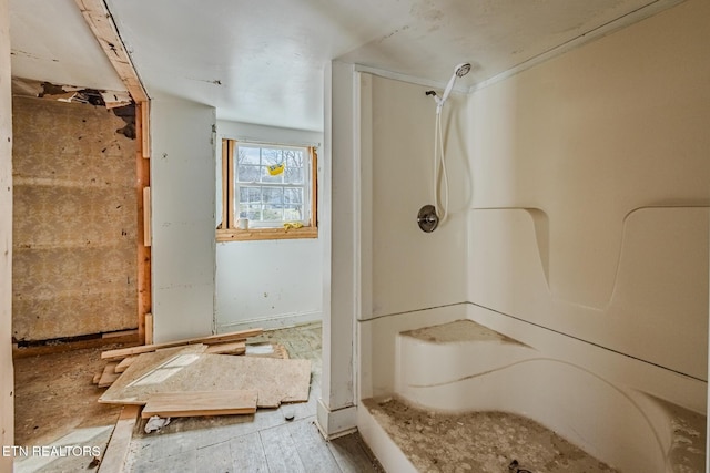 bathroom featuring walk in shower