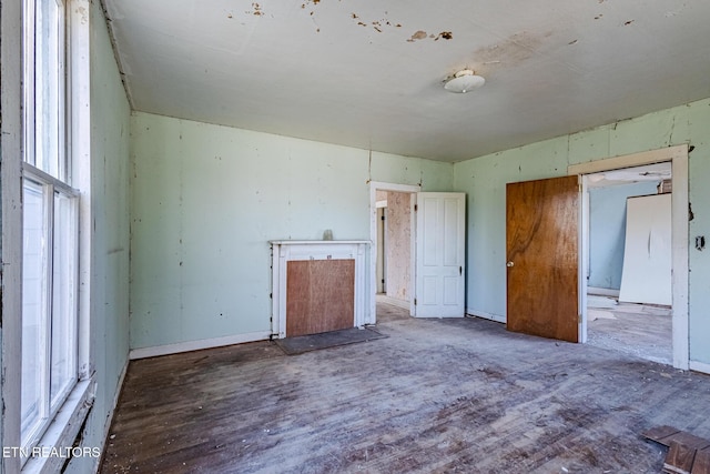 spare room featuring wood finished floors