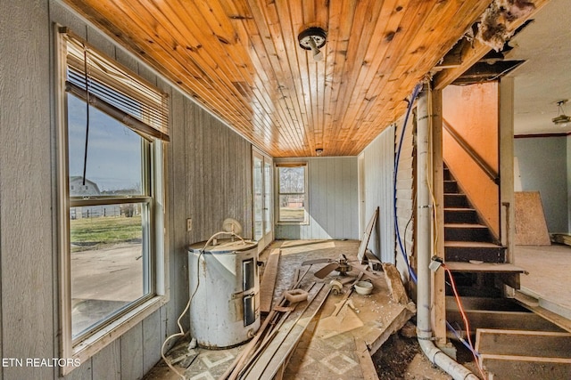 miscellaneous room featuring stairway and wood ceiling