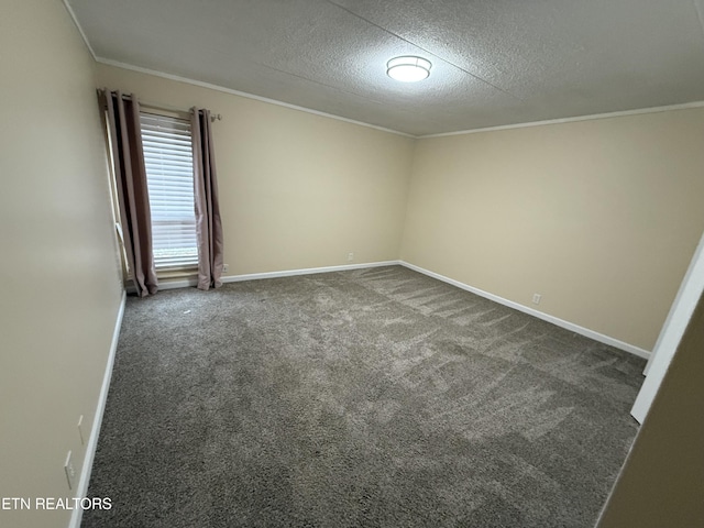 carpeted empty room featuring a textured ceiling, ornamental molding, and baseboards