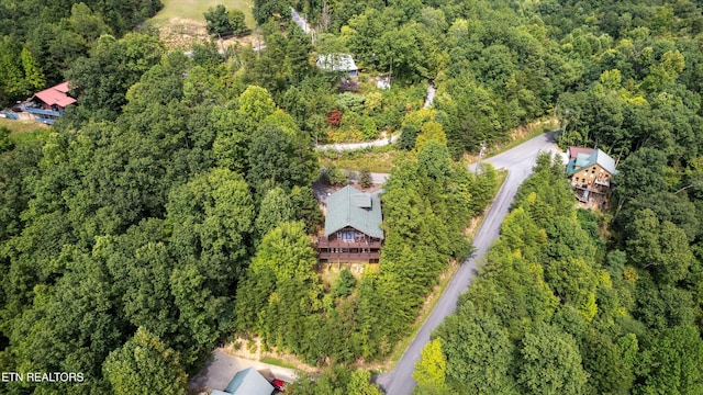 aerial view featuring a view of trees
