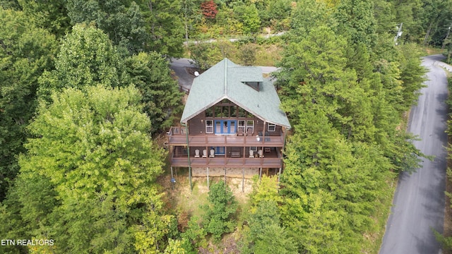 drone / aerial view with a view of trees