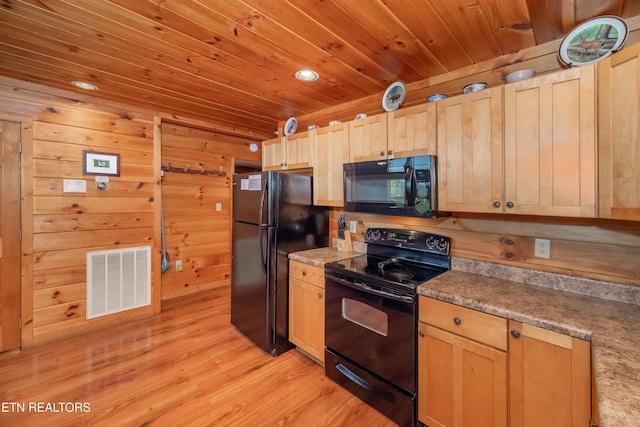 kitchen featuring visible vents, light brown cabinets, light wood-type flooring, wooden ceiling, and black appliances