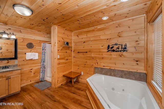 full bath featuring wood finished floors, vanity, wood ceiling, a shower with curtain, and a whirlpool tub