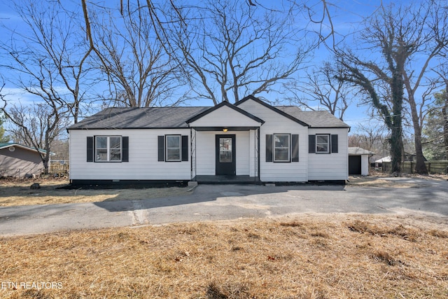 view of front of home with roof with shingles