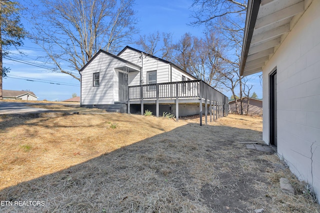 exterior space with a wooden deck