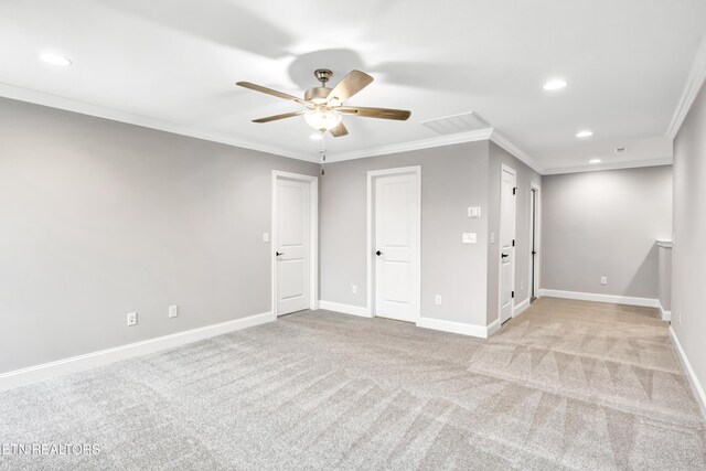 empty room with recessed lighting, baseboards, a ceiling fan, and ornamental molding