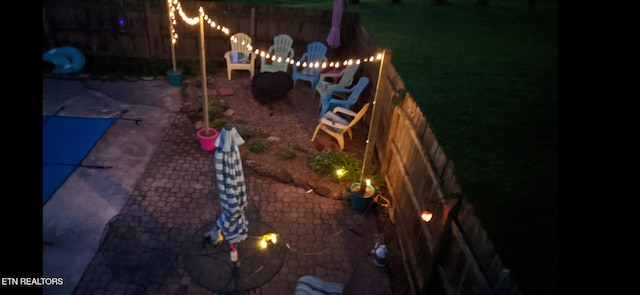 view of yard with a patio and fence