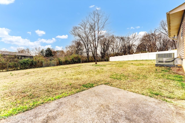 view of yard featuring a patio area and fence