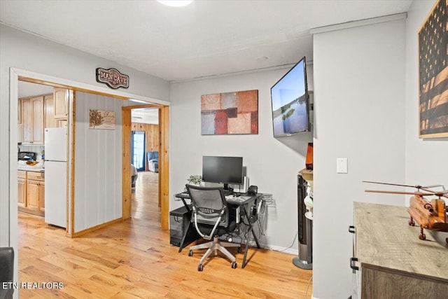 office with light wood-style floors