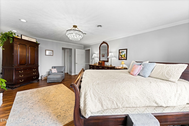 bedroom with a notable chandelier, dark wood-type flooring, and ornamental molding