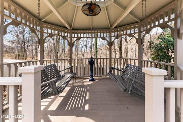 wooden deck featuring a gazebo