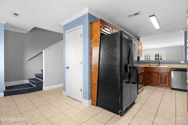 kitchen featuring light tile patterned floors, visible vents, black fridge with ice dispenser, range, and dishwasher