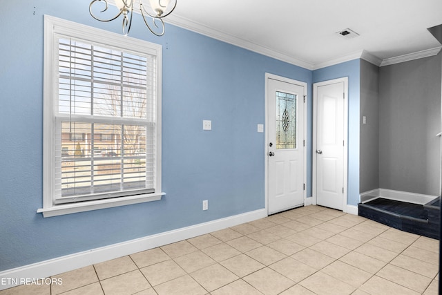 tiled entryway with visible vents, ornamental molding, a chandelier, and baseboards