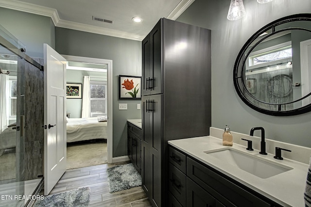 full bath featuring ensuite bathroom, visible vents, wood tiled floor, a stall shower, and crown molding