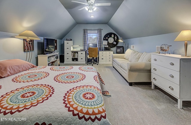 carpeted bedroom featuring a ceiling fan and lofted ceiling