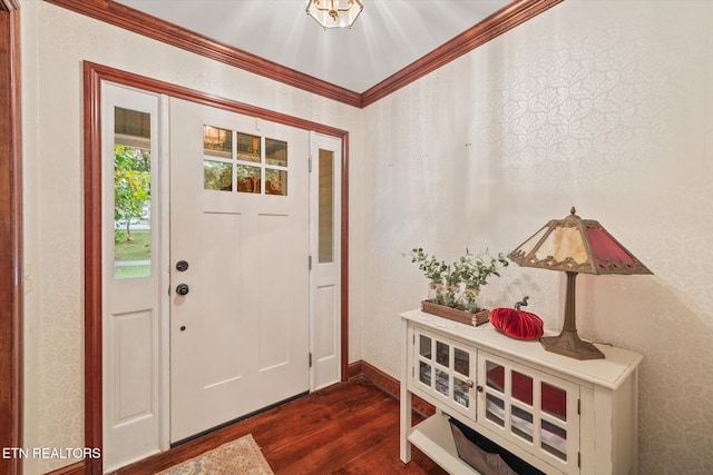 entryway featuring dark wood-style floors, crown molding, and baseboards