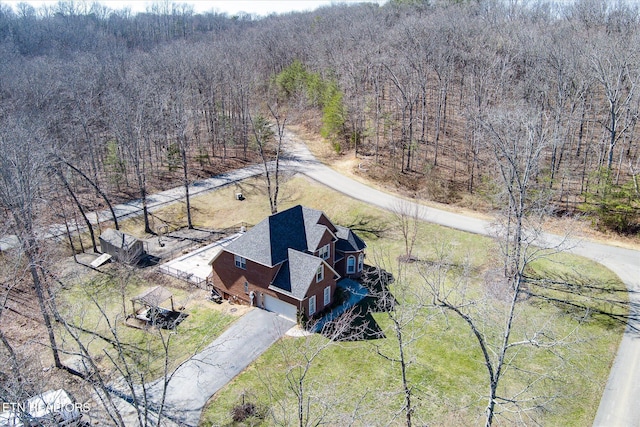 drone / aerial view with a forest view