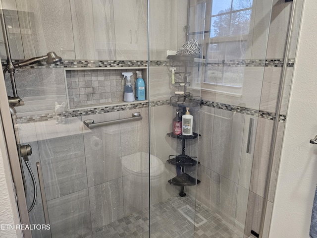 full bathroom with a shower stall