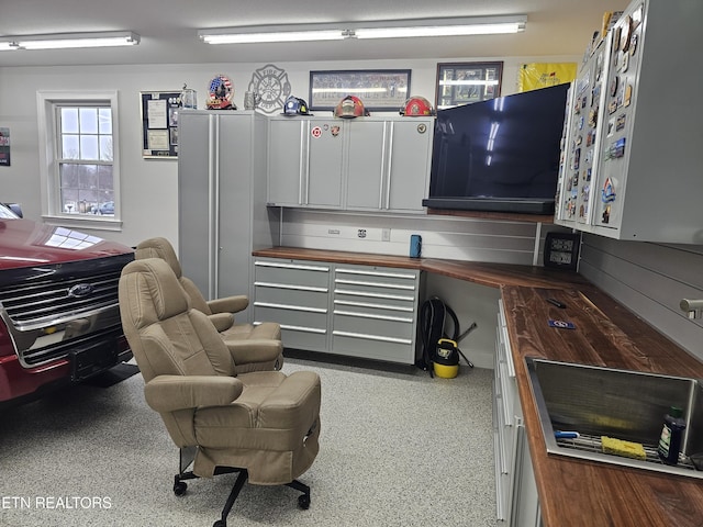 interior space featuring speckled floor