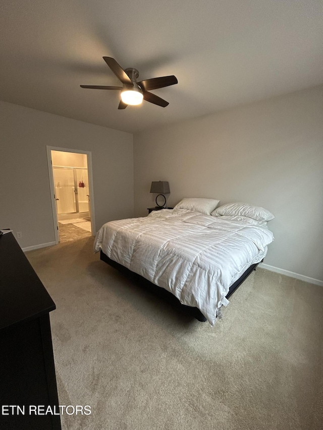 bedroom with a ceiling fan, carpet, and baseboards