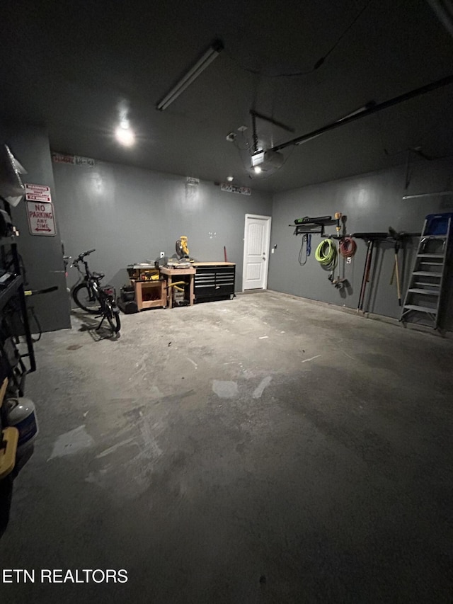 garage featuring a workshop area