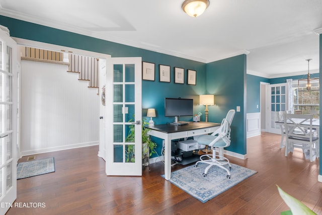 office space with a notable chandelier, ornamental molding, wood finished floors, french doors, and baseboards