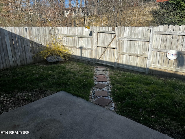 view of yard with a gate and fence