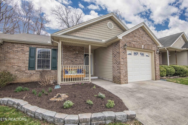 single story home with brick siding, a porch, concrete driveway, and an attached garage