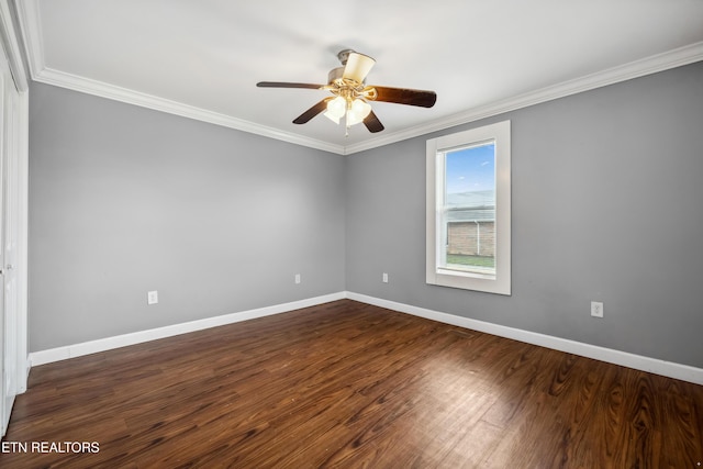 unfurnished room with a ceiling fan, baseboards, ornamental molding, and wood finished floors