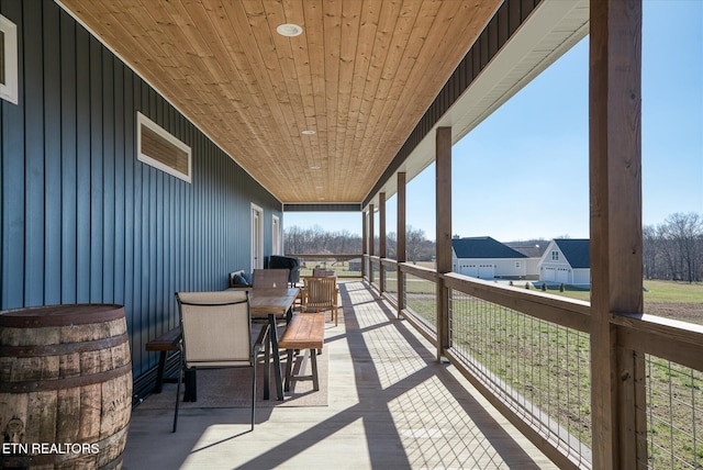 sunroom / solarium with wooden ceiling