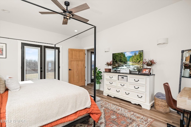 bedroom featuring ceiling fan, recessed lighting, access to outside, french doors, and light wood finished floors