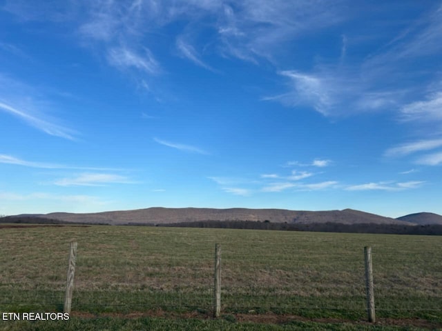 property view of mountains featuring a rural view