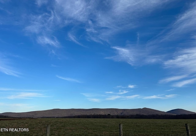 property view of mountains featuring a rural view