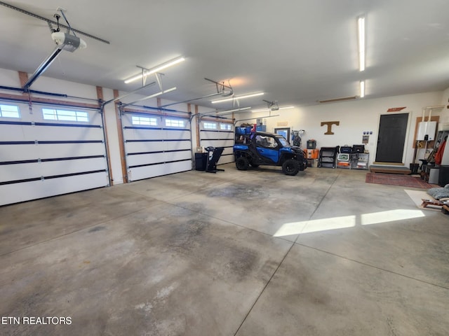 garage featuring a garage door opener