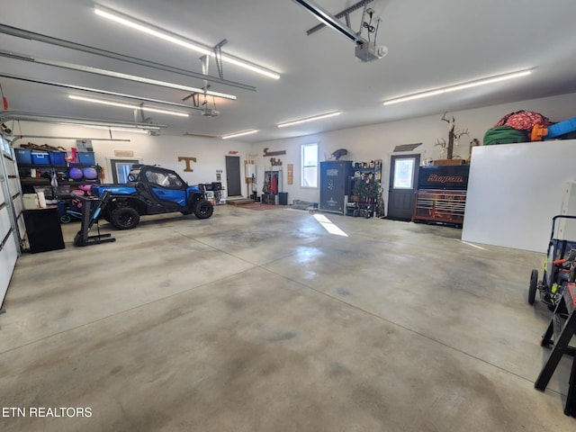 garage featuring a garage door opener