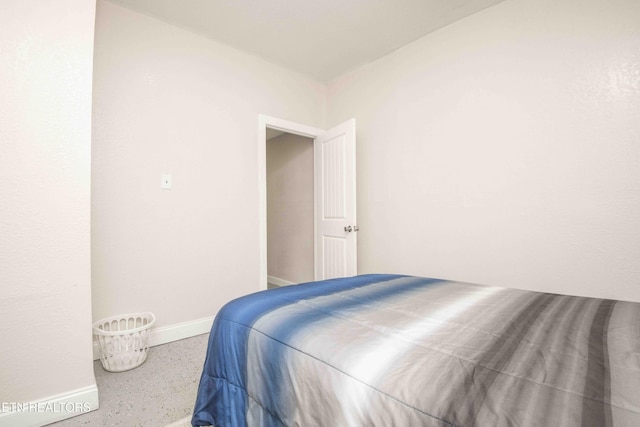 bedroom with baseboards