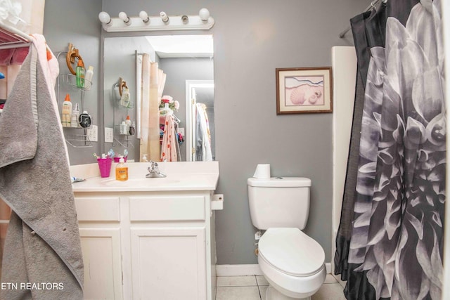 full bath with baseboards, toilet, a shower with curtain, tile patterned flooring, and vanity