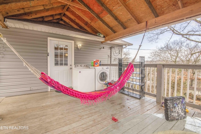 deck featuring separate washer and dryer