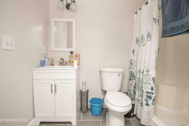 full bath featuring tile patterned flooring, vanity, toilet, and a shower with curtain